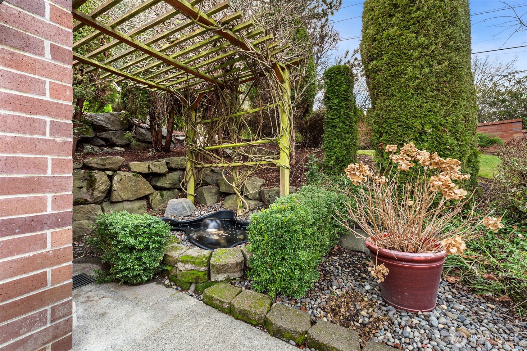 19301 4th Place Southwest Normandy Park, WA 98166 - Photo 29 of 40 a garden view with a seating space