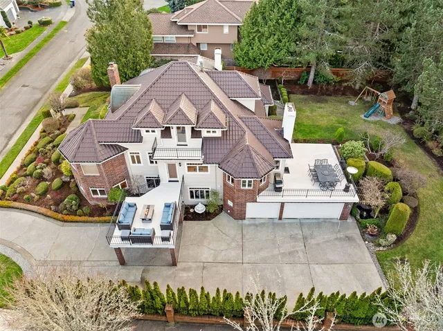a view of staircase with white walls and a window