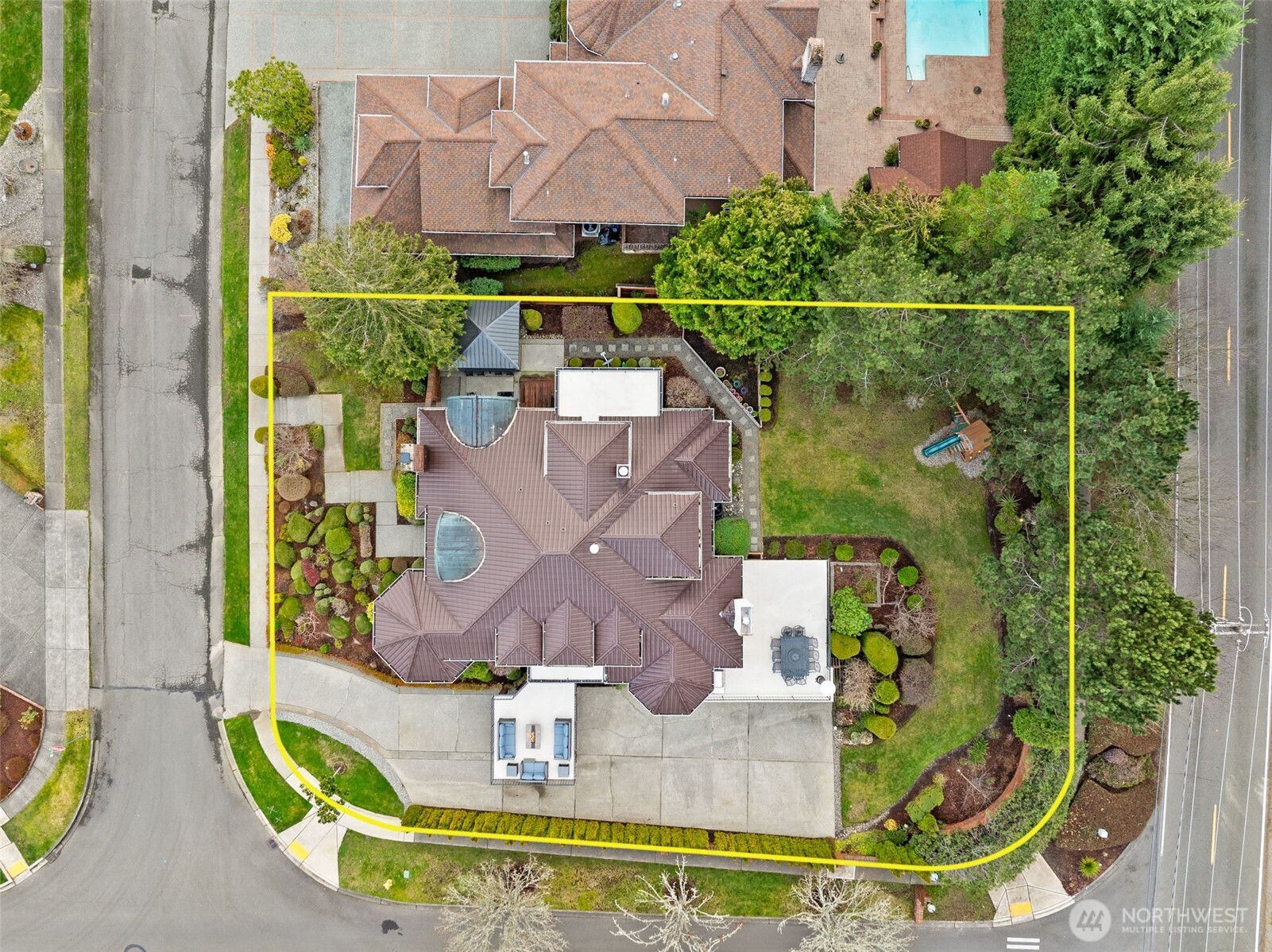 19301 4th Place Southwest Normandy Park, WA 98166 - Photo 32 of 40 an aerial view of multi story residential apartment building with swimming pool