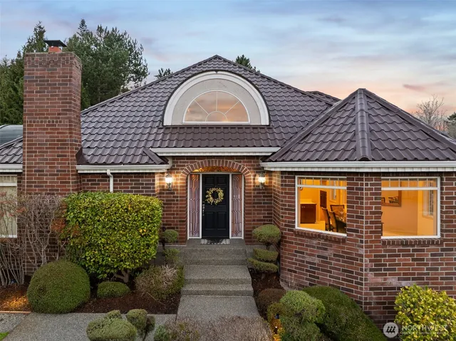 an aerial view of a house with a garden