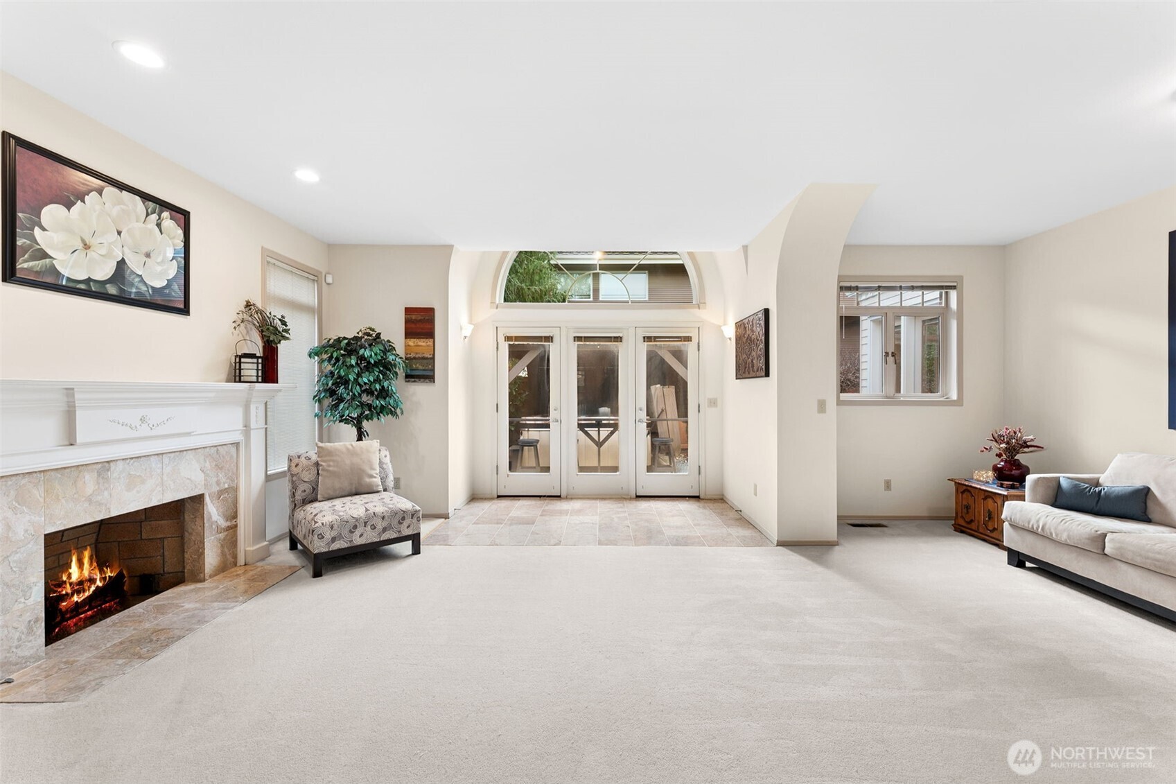 19301 4th Place Southwest Normandy Park, WA 98166 - Photo 5 of 40 a living room with furniture and a fireplace