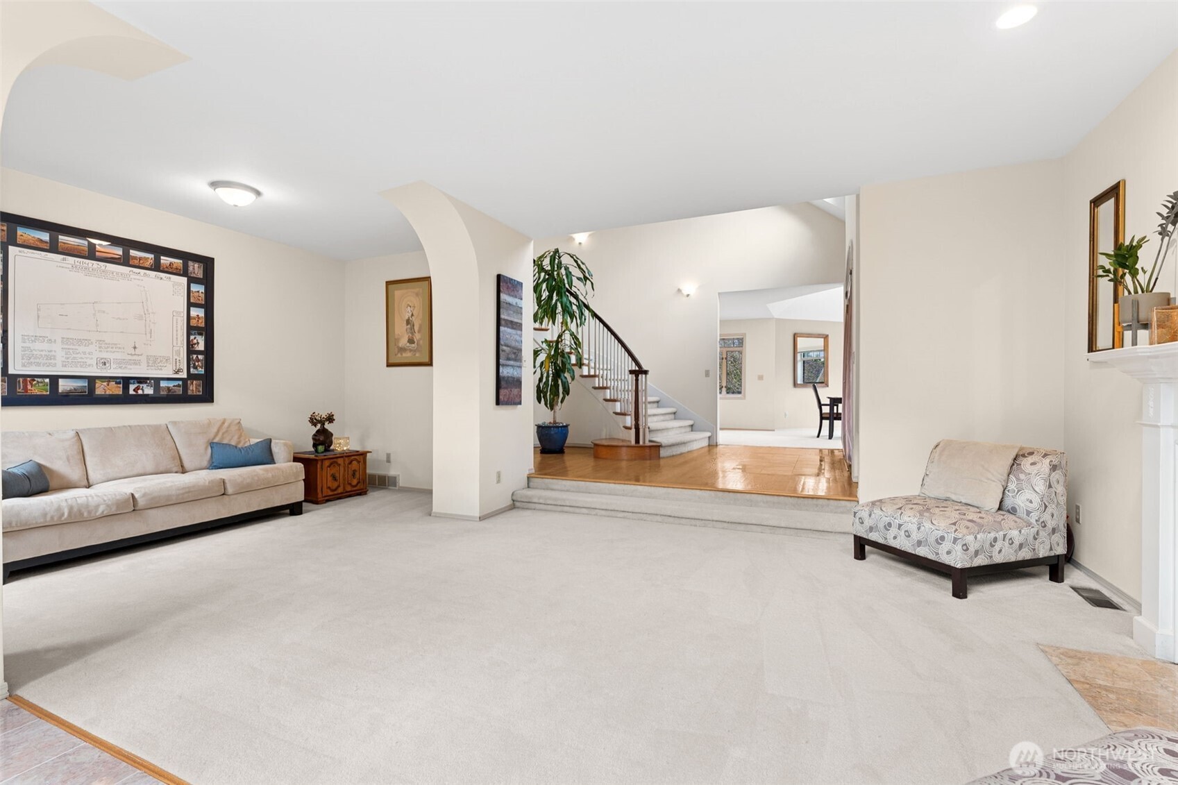 19301 4th Place Southwest Normandy Park, WA 98166 - Photo 6 of 40 a living room with furniture and a flat screen tv