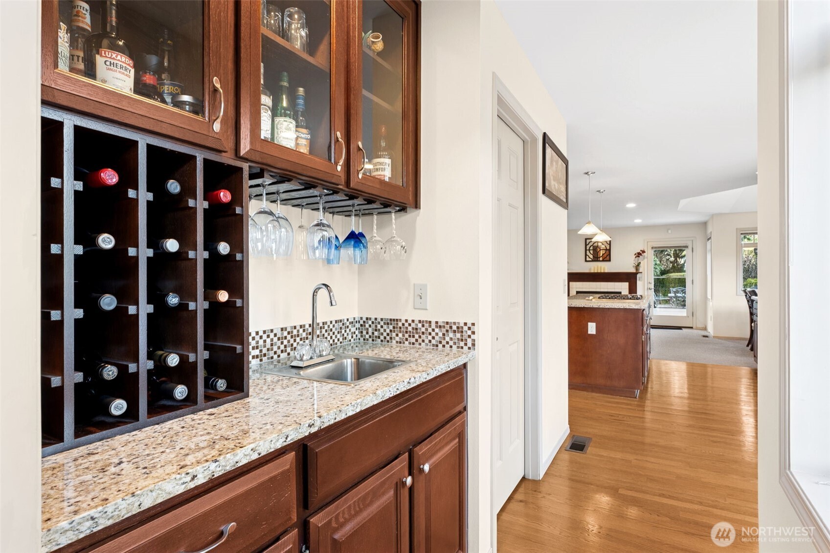 19301 4th Place Southwest Normandy Park, WA 98166 - Photo 8 of 37 a kitchen with granite countertop a sink and cabinets