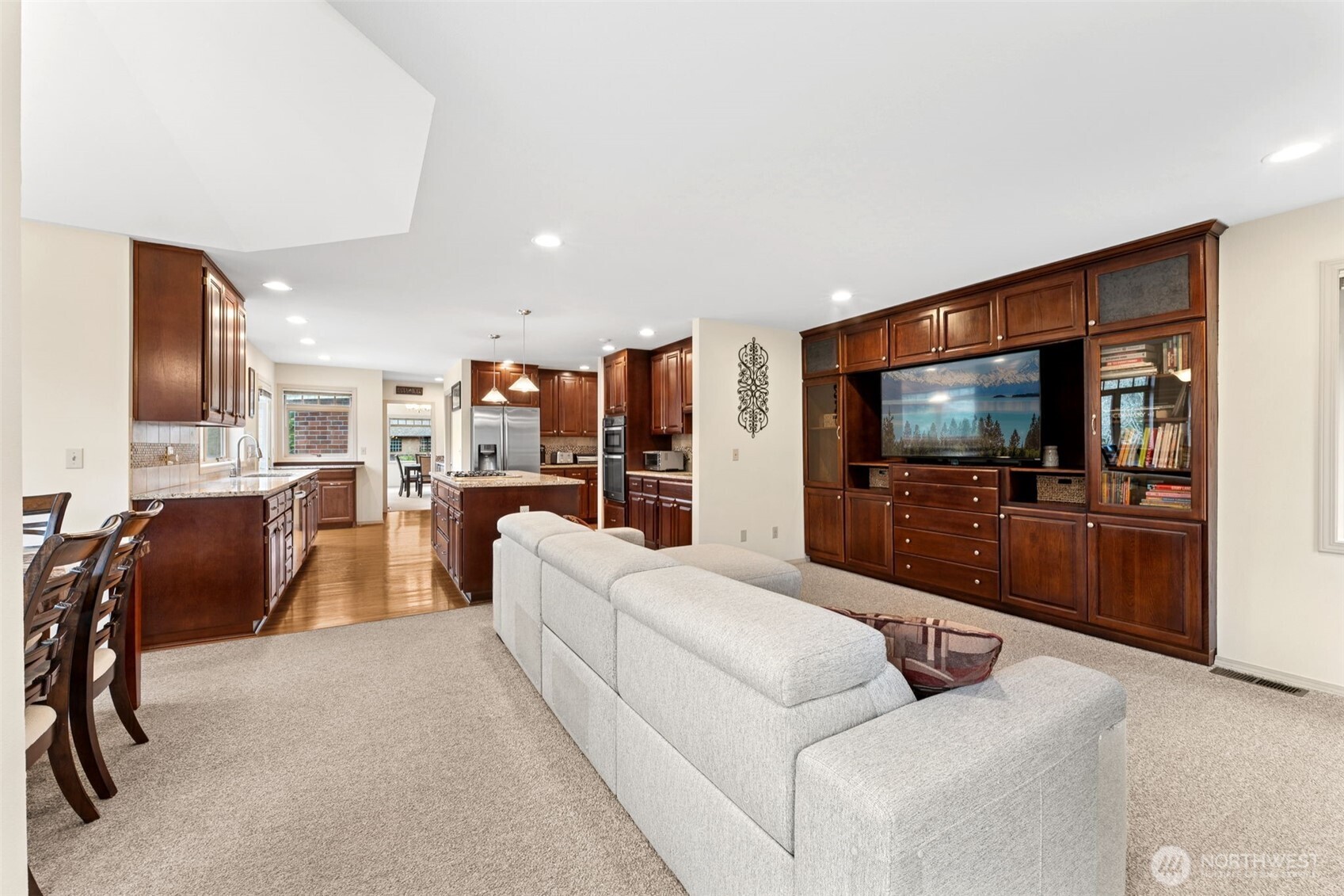 19301 4th Place Southwest Normandy Park, WA 98166 - Photo 8 of 40 a living room with furniture and a flat screen tv