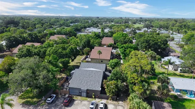 an aerial view of a house with a garden