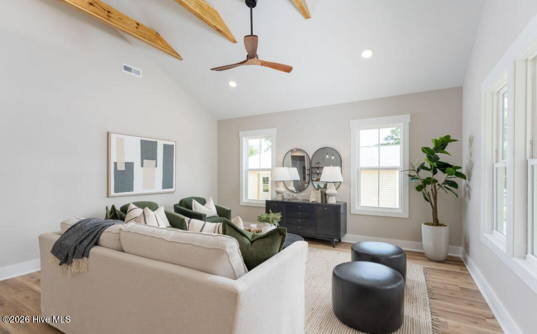 133 Spring Road Wilmington, NC 28401 - Photo 5 of 29 Spacious Living Room with high ceilings and beautiful beams across the ceiling