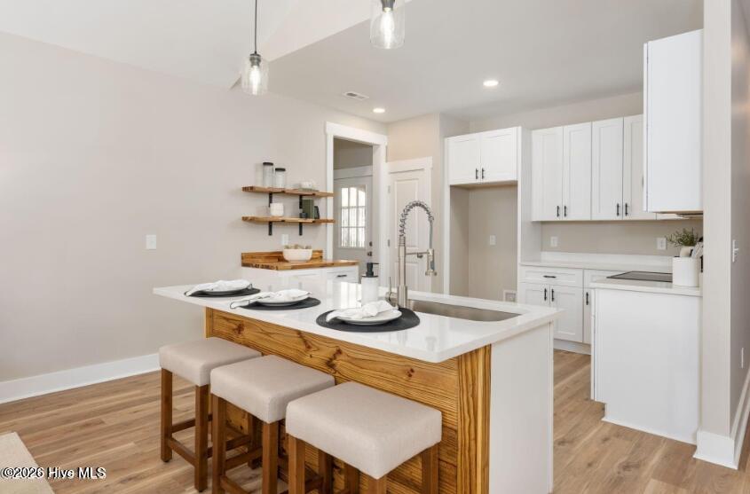 133 Spring Road Wilmington, NC 28401 - Photo 8 of 29 Kitchen Island with bar top seating
