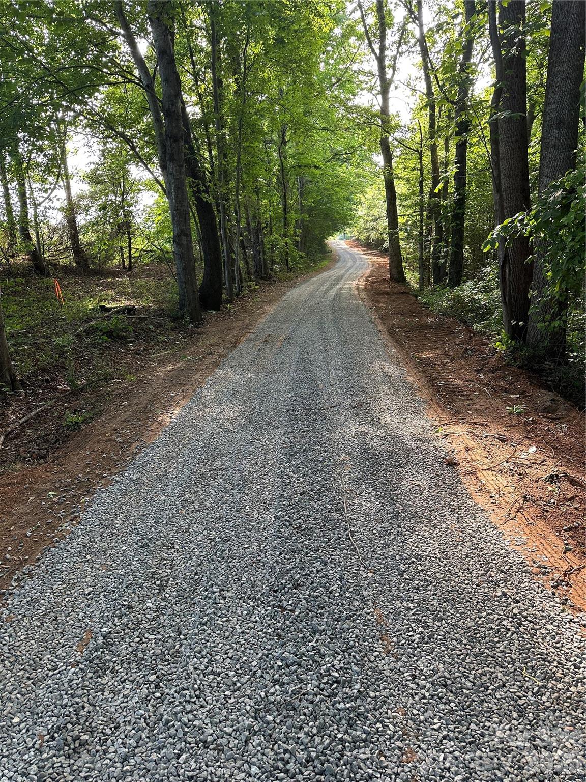0 Stikeleather Road Hiddenite, NC 28636 - Photo 8 of 28 a view of a yard with large trees