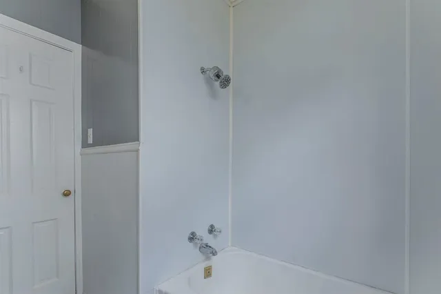 a bathroom with a bathtub