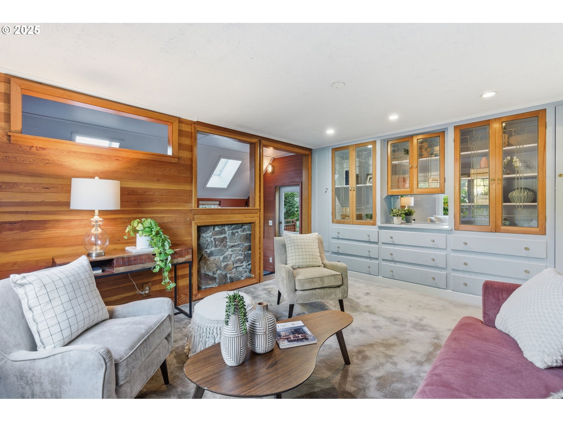 8015 Southwest 45th Avenue Portland, OR 97219 - Photo 14 of 38 a living room with furniture and a large window