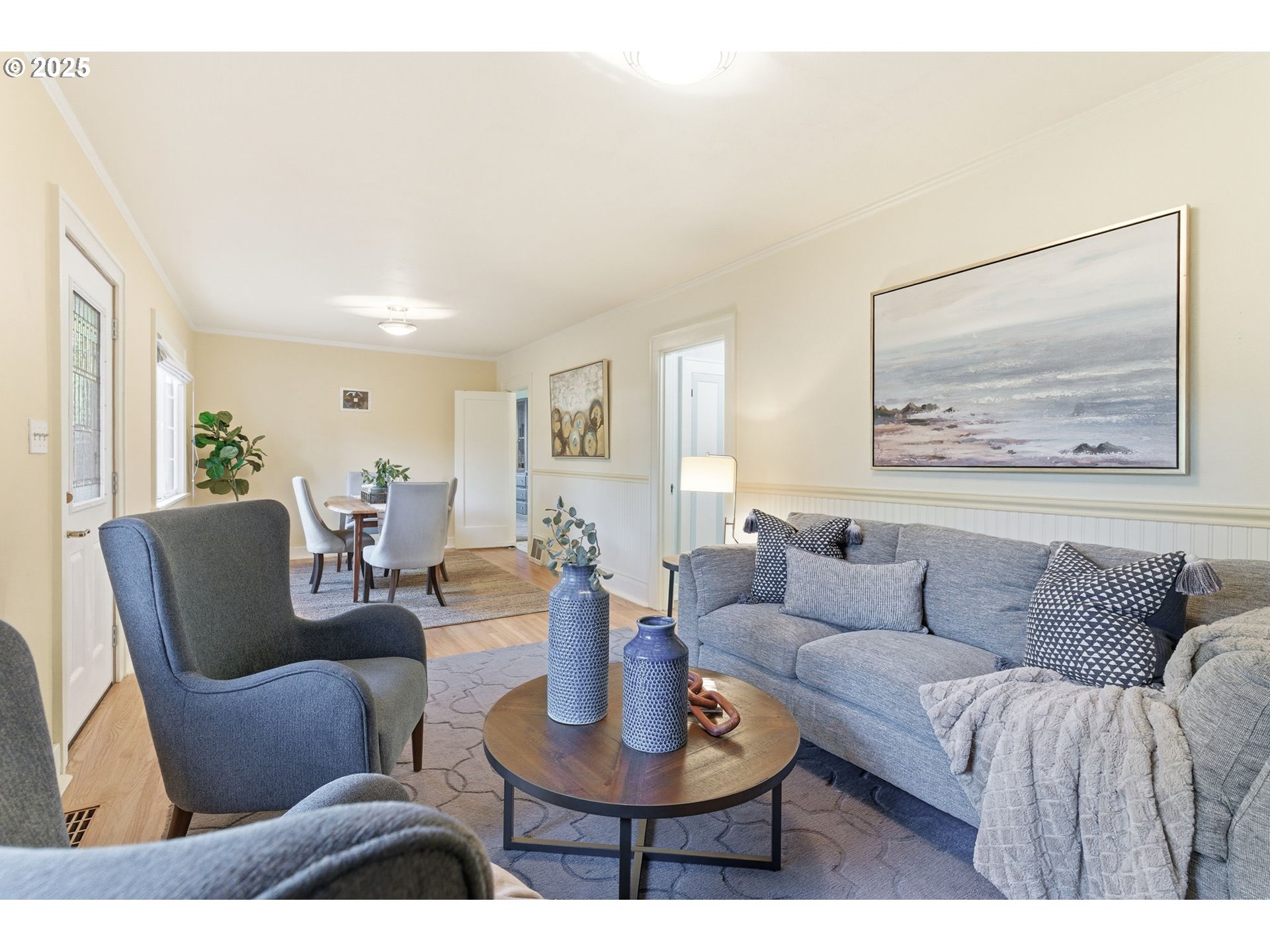 8015 Southwest 45th Avenue Portland, OR 97219 - Photo 6 of 38 a living room with furniture and a painting