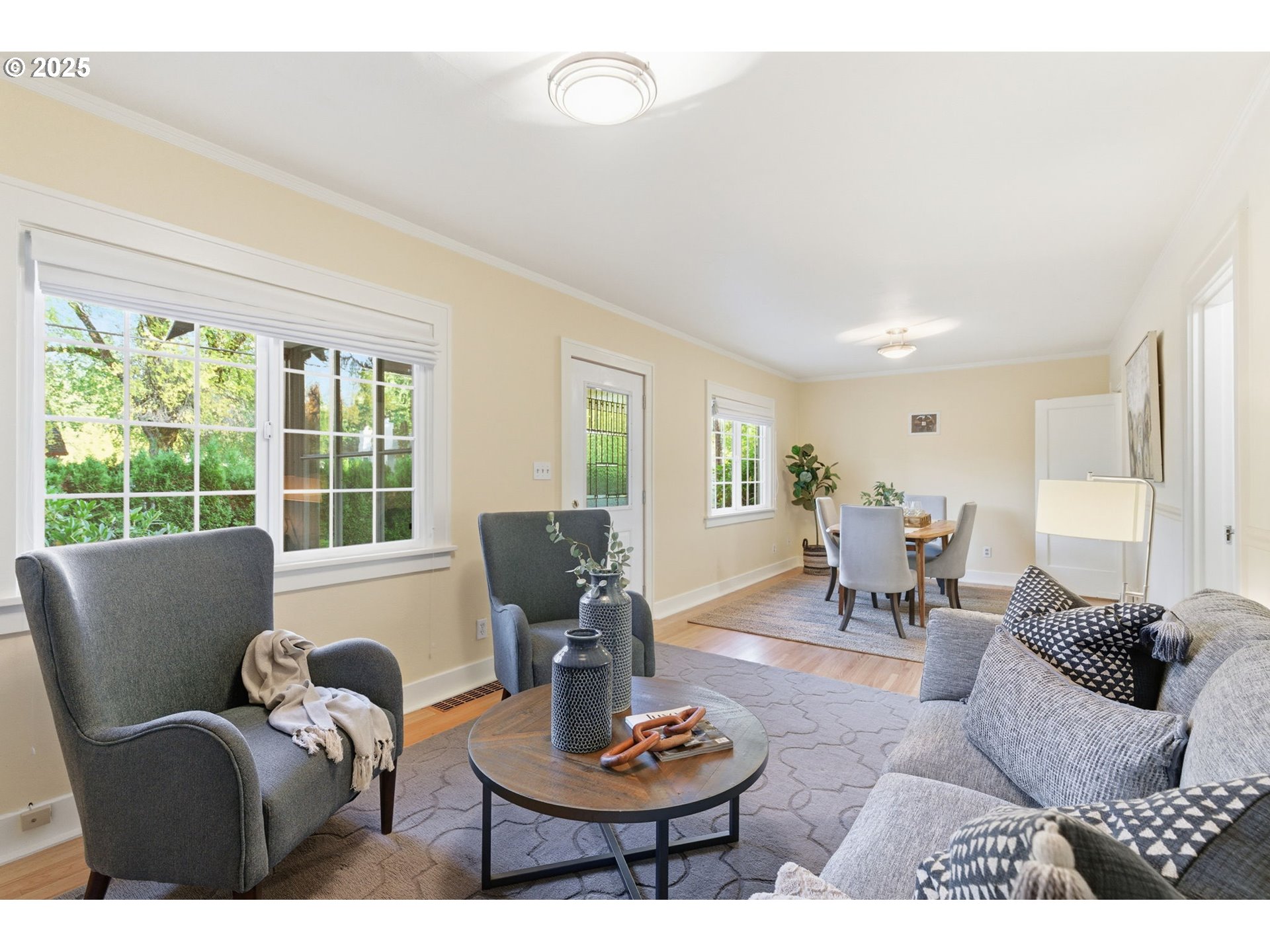 8015 Southwest 45th Avenue Portland, OR 97219 - Photo 7 of 38 a living room with furniture and a large window