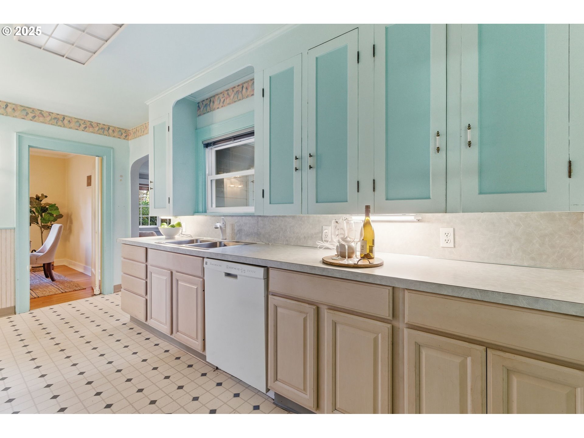 8015 Southwest 45th Avenue Portland, OR 97219 - Photo 10 of 38 a bathroom with a sink and a mirror