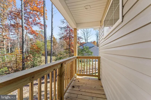 a bathroom with a sink a mirror and shower