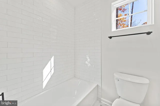 a view of an entryway with a window