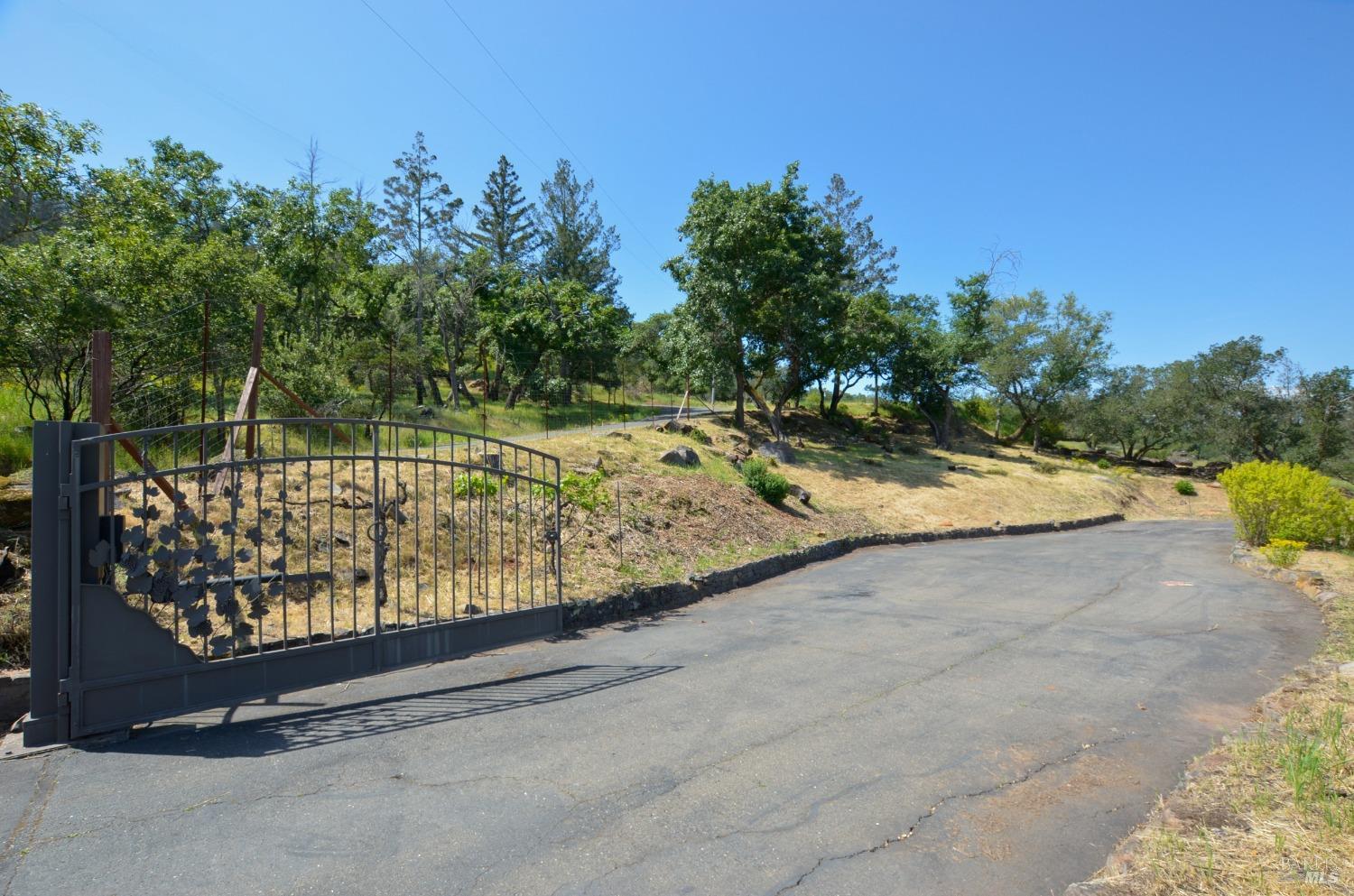 3577 Deer Trail Road Santa Rosa, CA 95404 - Photo 13 of 25 Gated entrance to the paved driveway
