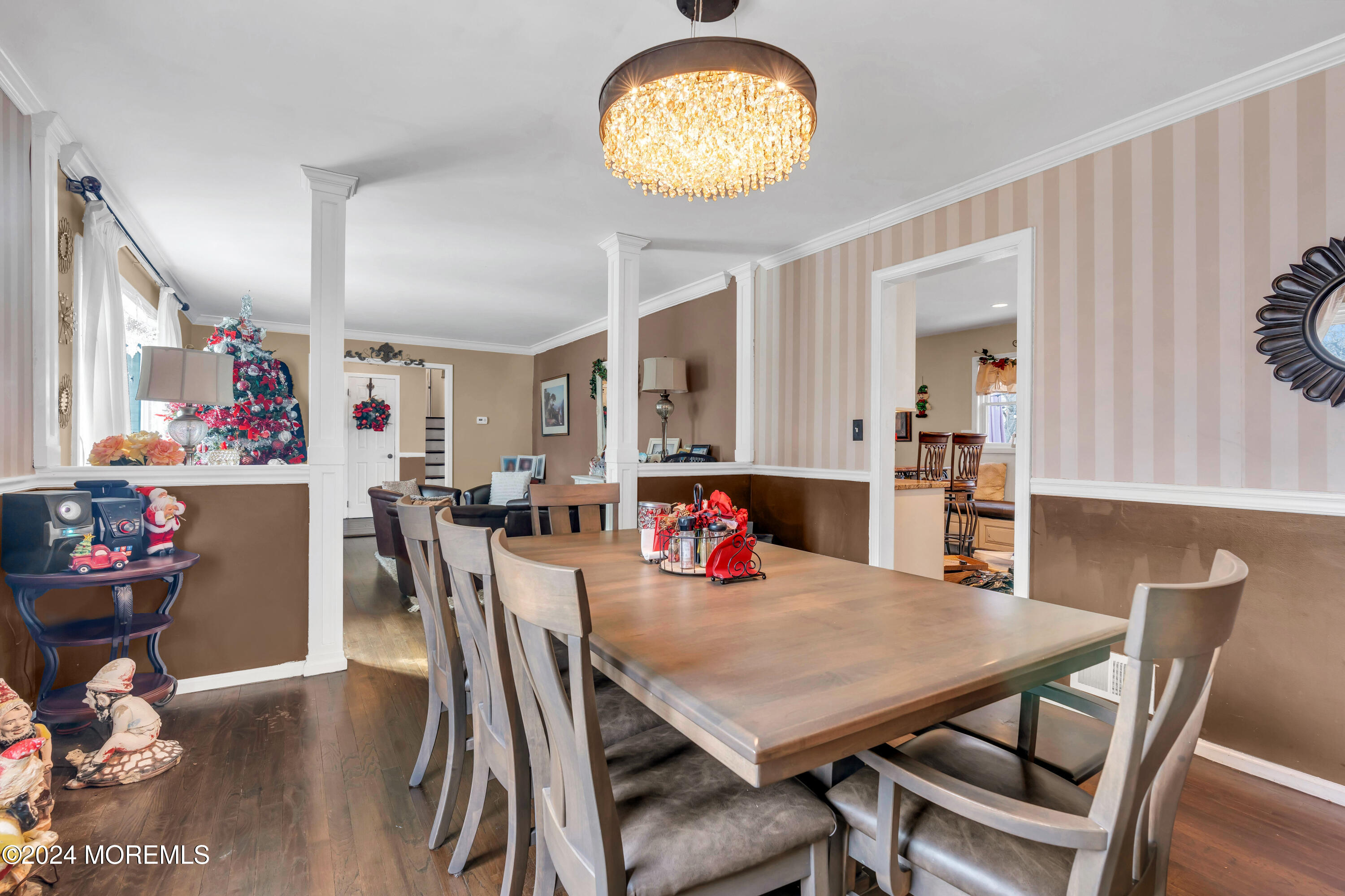 50 Hawthorne Road Middletown, NJ 07701 - Photo 14 of 33 a view of a dining room with furniture and wooden floor
