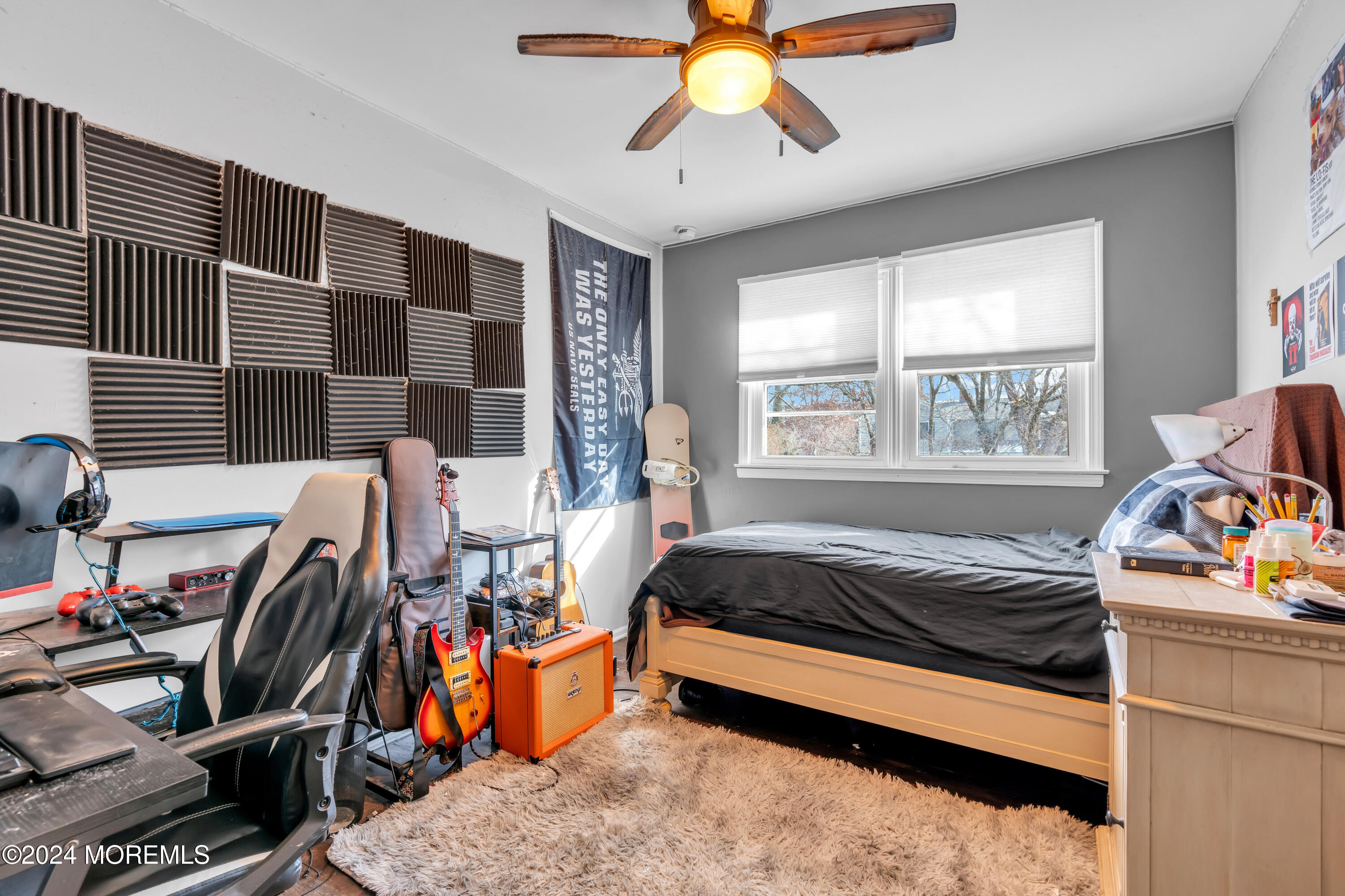 50 Hawthorne Road Middletown, NJ 07701 - Photo 22 of 33 a bedroom with a bed and a window