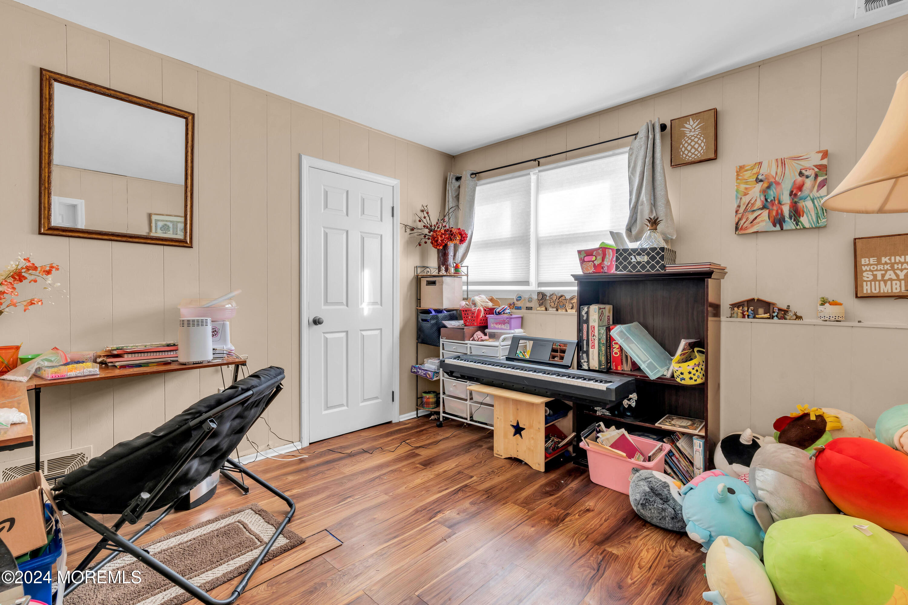 50 Hawthorne Road Middletown, NJ 07701 - Photo 24 of 33 a bed room with a bed and a desk