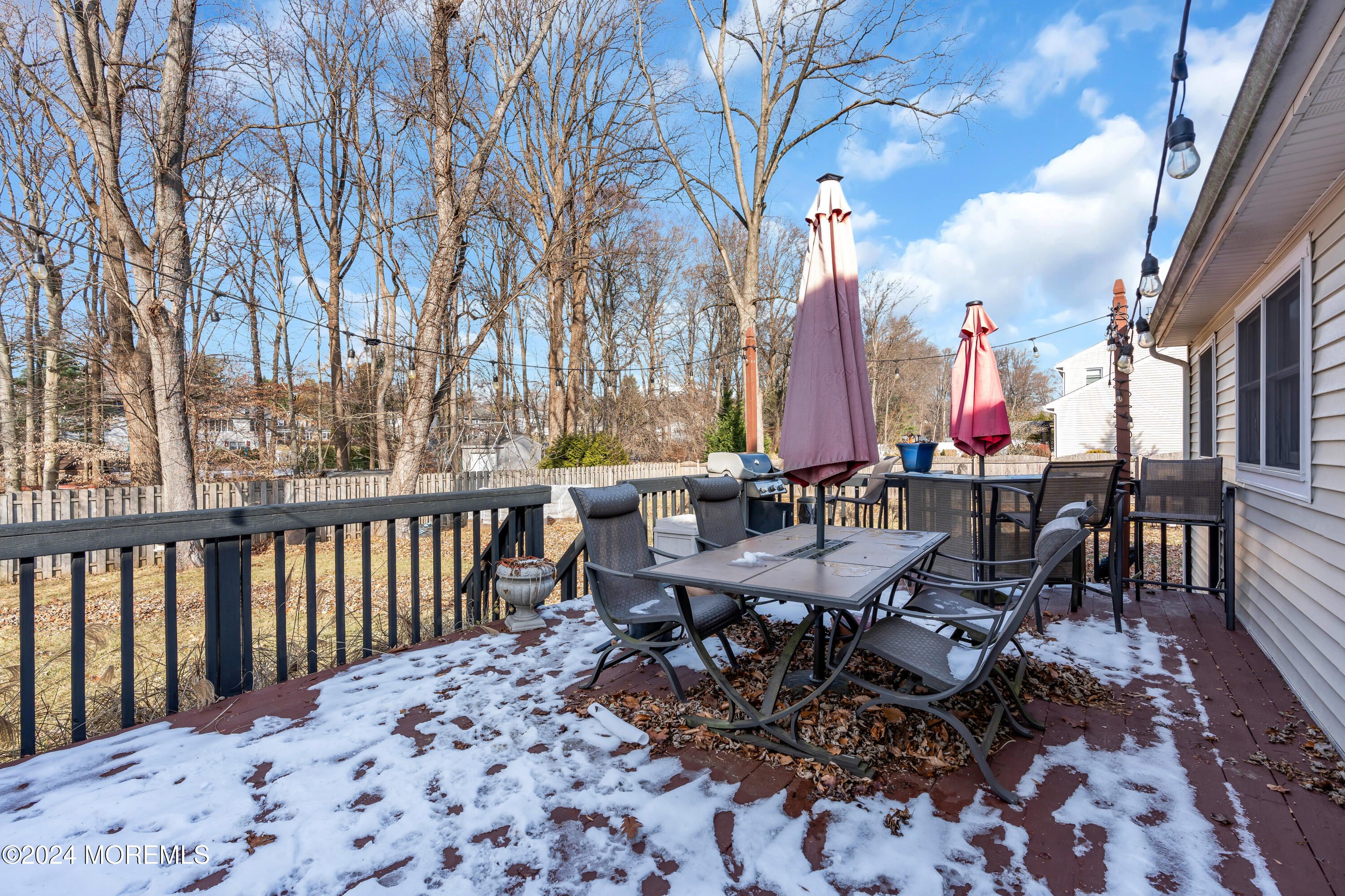 50 Hawthorne Road Middletown, NJ 07701 - Photo 29 of 33 a view of a dinning tables and chairs in a patio