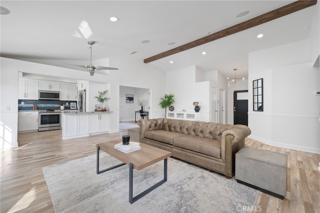 2973 Bonanza San Clemente, CA 92673 - Photo 11 of 41 a living room with furniture and kitchen view
