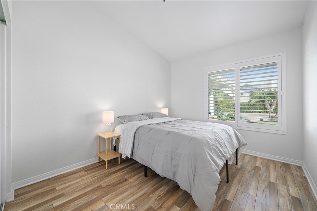 2973 Bonanza San Clemente, CA 92673 - Photo 20 of 41 a bed sitting in a bedroom next to a window