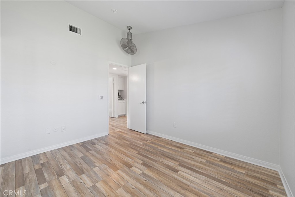 2973 Bonanza San Clemente, CA 92673 - Photo 24 of 41 a view of a room with wooden floor and white walls