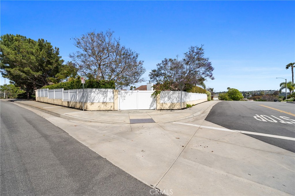 2973 Bonanza San Clemente, CA 92673 - Photo 34 of 41 a view of a road with a building in the background