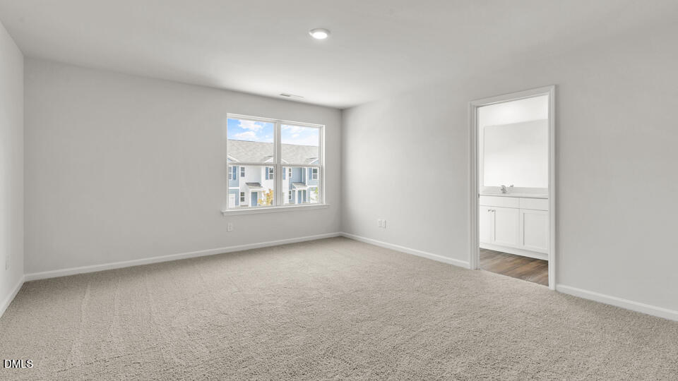 560 Stream Walk Crossing Wendell, NC 27591 - Photo 20 of 41 an empty room with windows