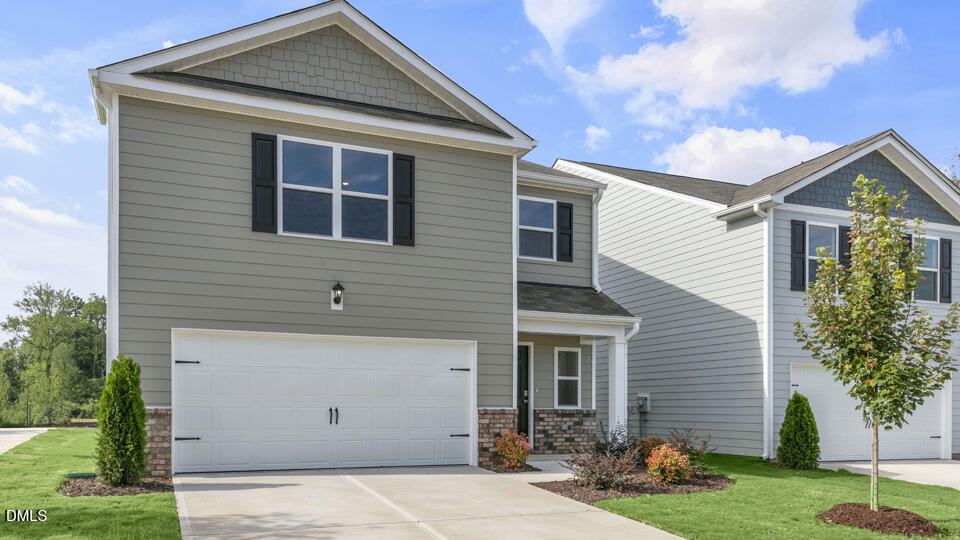 560 Stream Walk Crossing Wendell, NC 27591 - Photo 2 of 41 a front view of a house with a yard