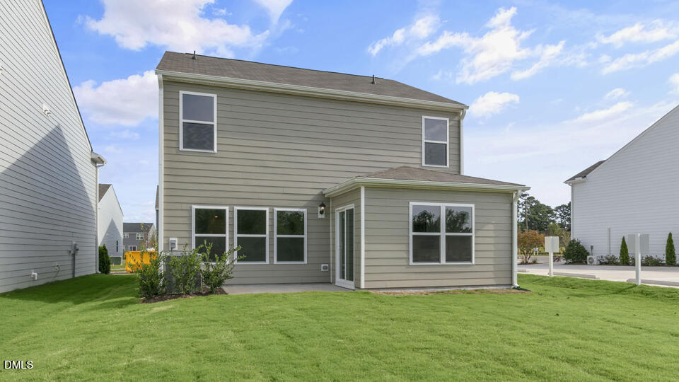 560 Stream Walk Crossing Wendell, NC 27591 - Photo 34 of 41 a view of a house with a backyard