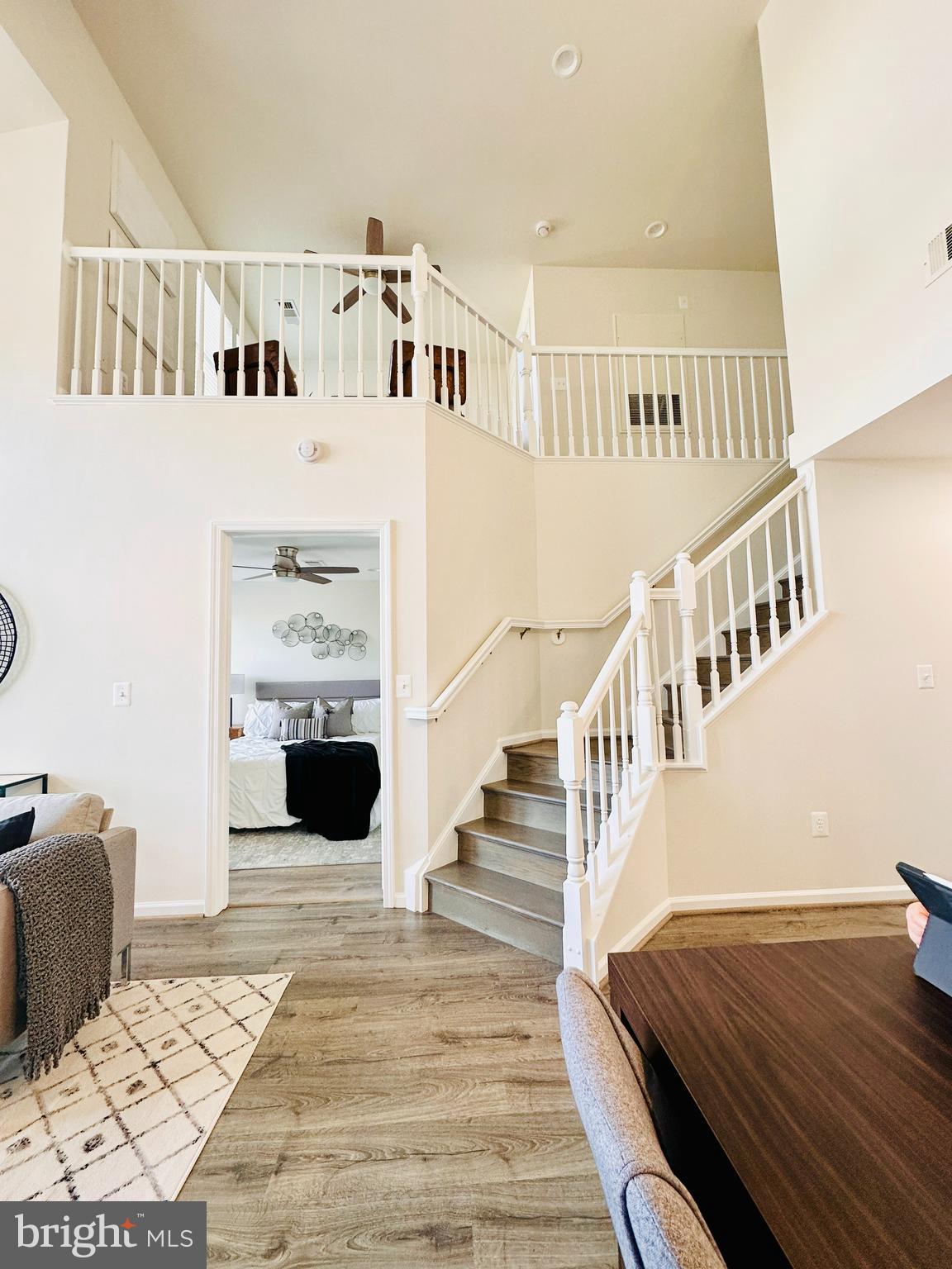 12000 Market Street, Unit 472 Reston, VA 20190 - Photo 4 of 8 a view of entryway and hall with wooden floor