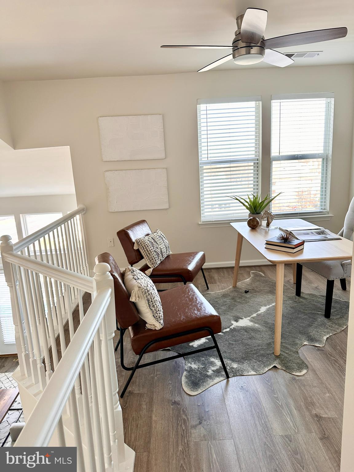 12000 Market Street, Unit 472 Reston, VA 20190 - Photo 6 of 8 a living room with furniture and a window