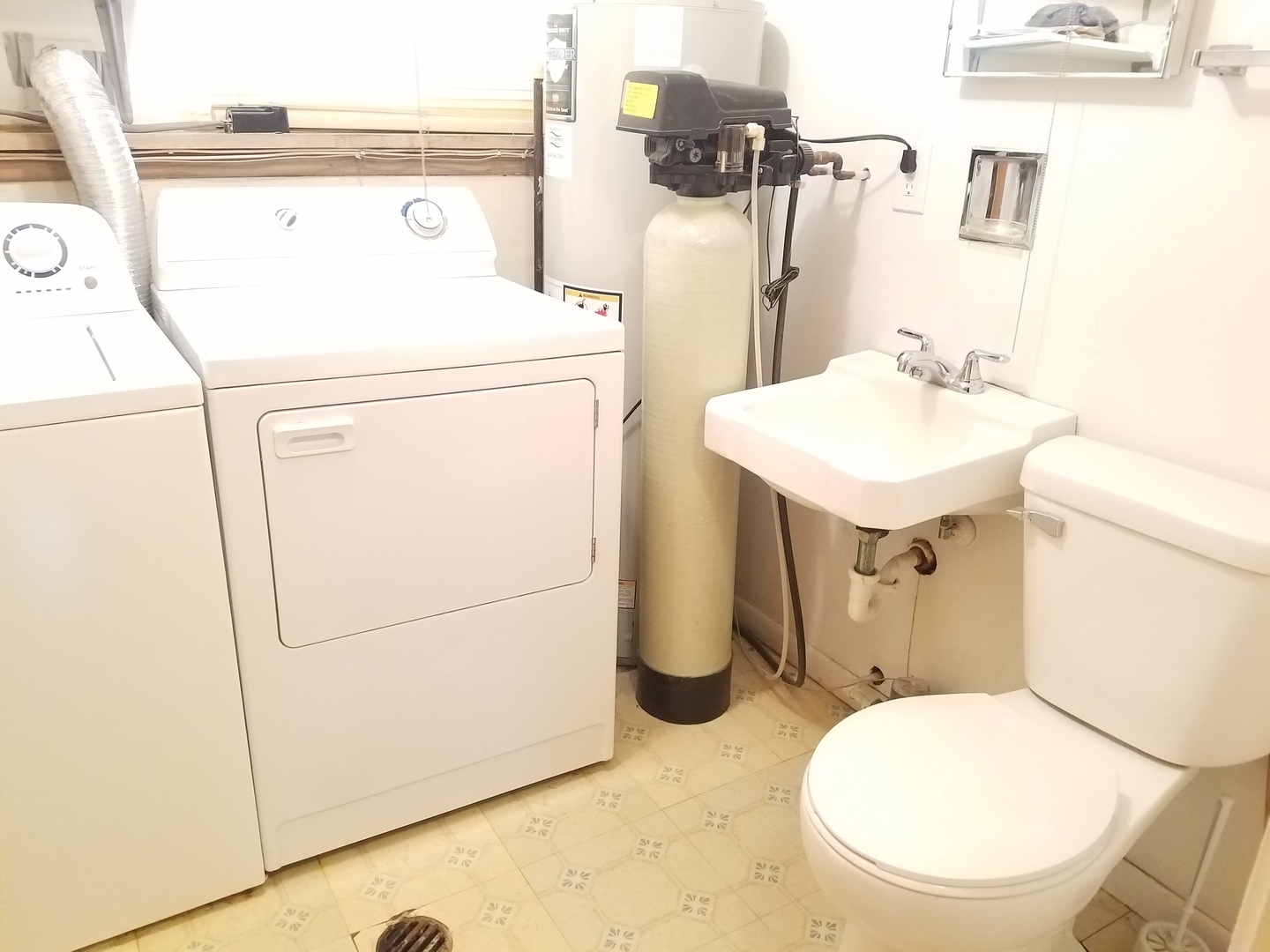 21 Durango Road Montgomery, IL 60538 - Photo 21 of 22 a bathroom with a sink a toilet and a mirror