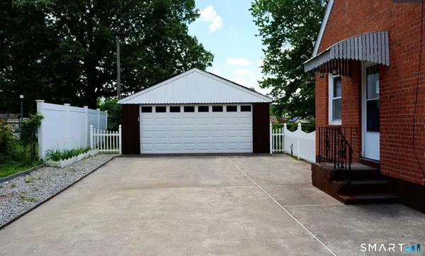 a front view of a house with a garage