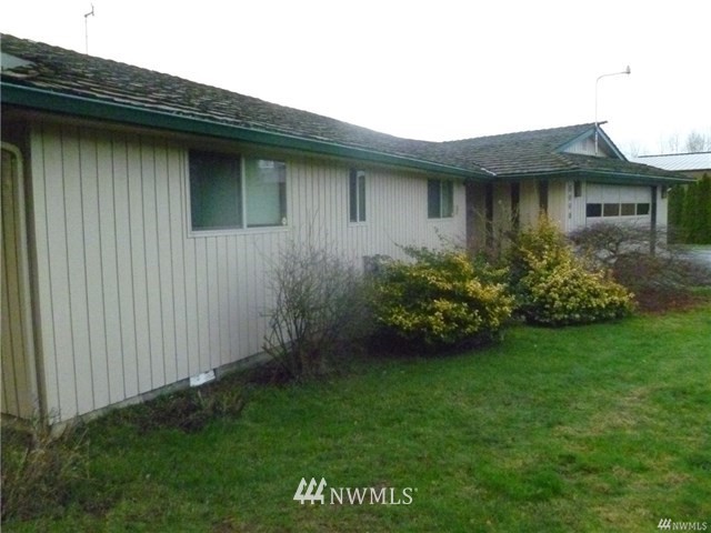 a view of a house with garden