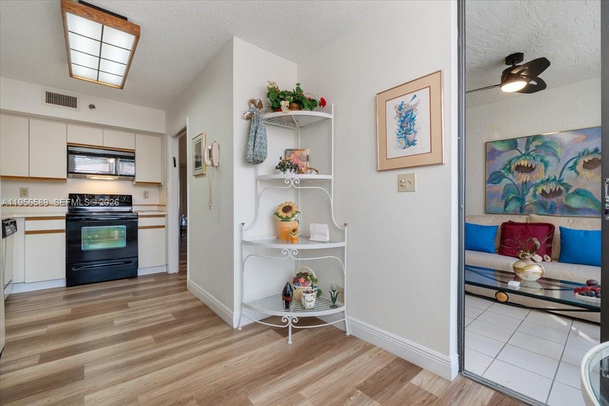 7201 Promenade Drive, Unit 101 Boca Raton, FL 33433 - Photo 20 of 54 a room with furniture and window