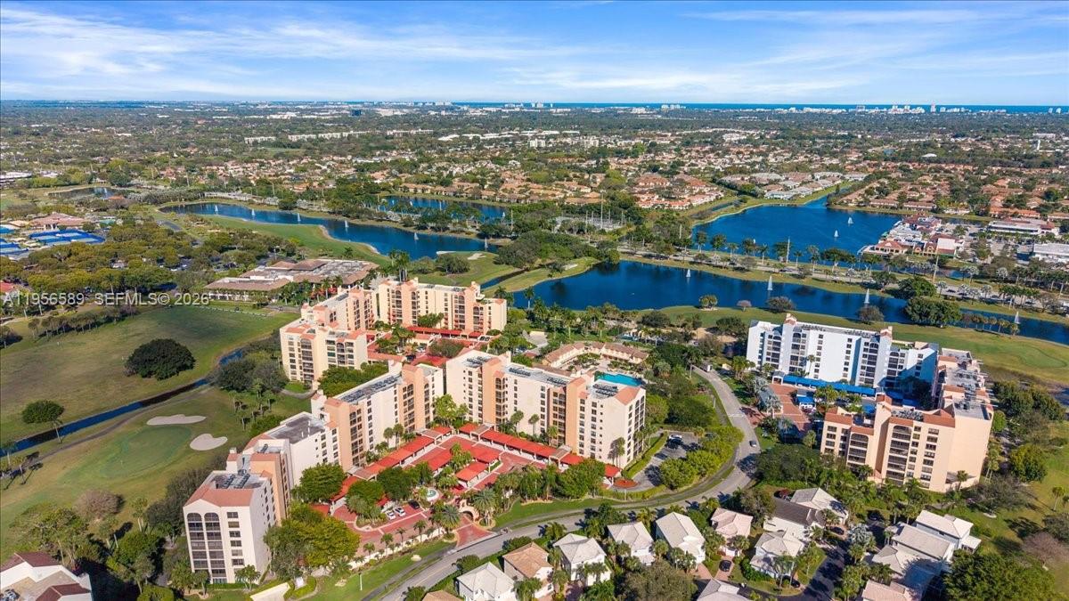 7201 Promenade Drive, Unit 101 Boca Raton, FL 33433 - Photo 46 of 54 an aerial view of residential houses with outdoor space