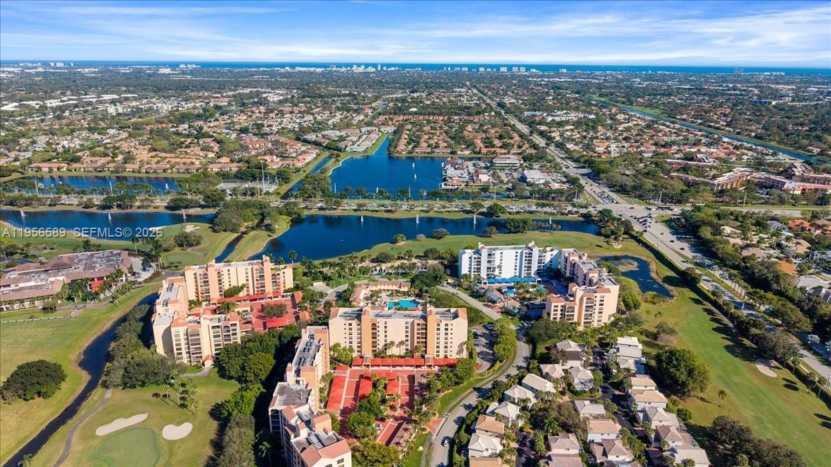 7201 Promenade Drive, Unit 101 Boca Raton, FL 33433 - Photo 48 of 54 an aerial view of residential houses with outdoor space