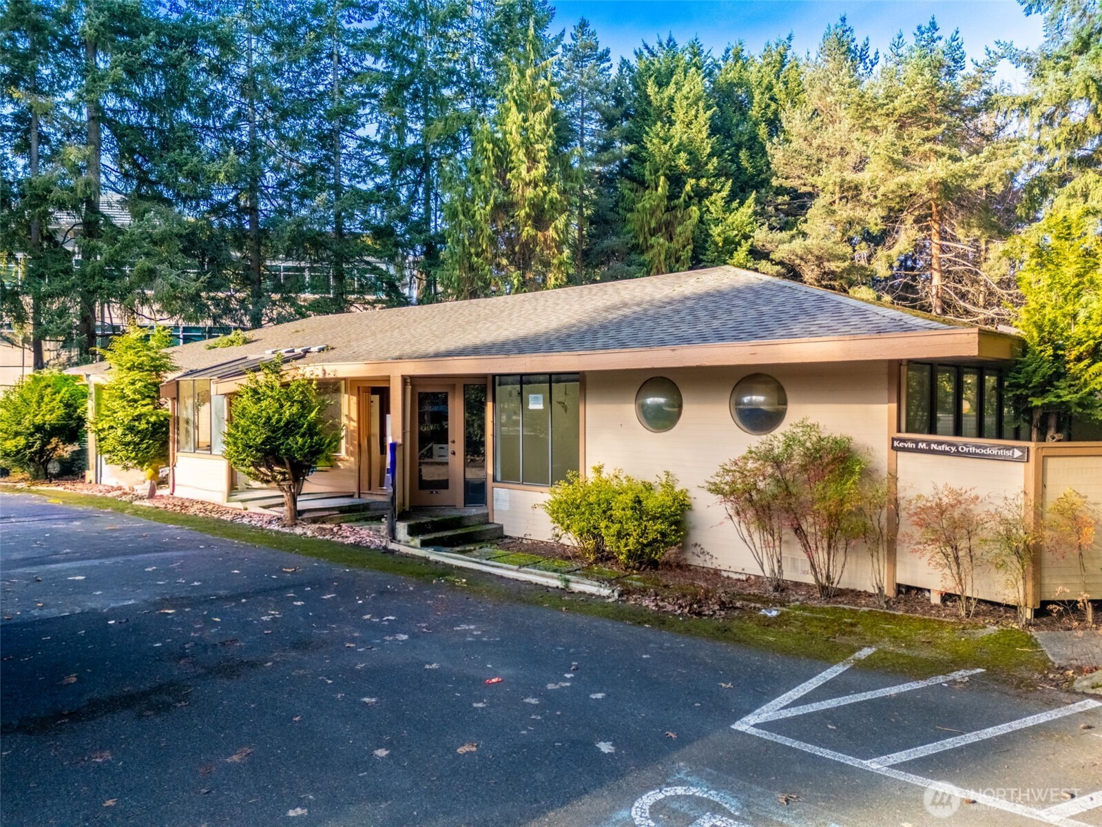 15700 Northeast Bel Red Road Bellevue, WA 98008 - Photo 11 of 11 front view of a house with a yard
