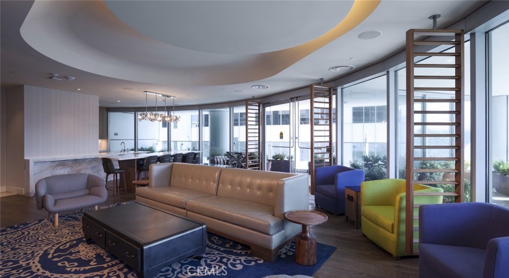 100 Van Ness Avenue, Unit 2315 San Francisco, CA 94102 - Photo 17 of 75 a living room with furniture and a large window