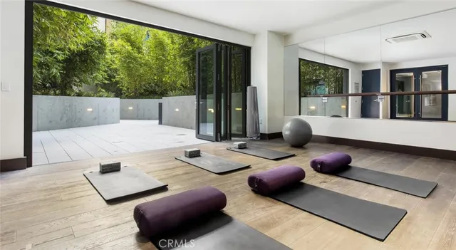 a swimming pool with outdoor seating and yard