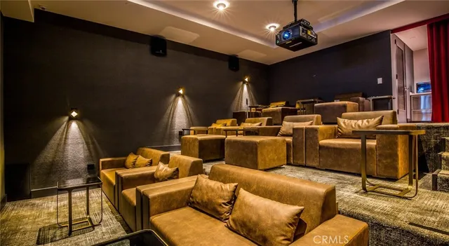 a front view of a multi story residential apartment building with a yard