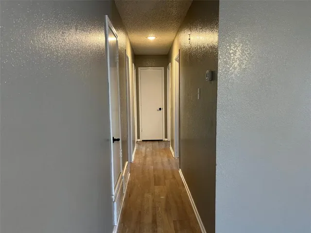 a view of hallway with stairs