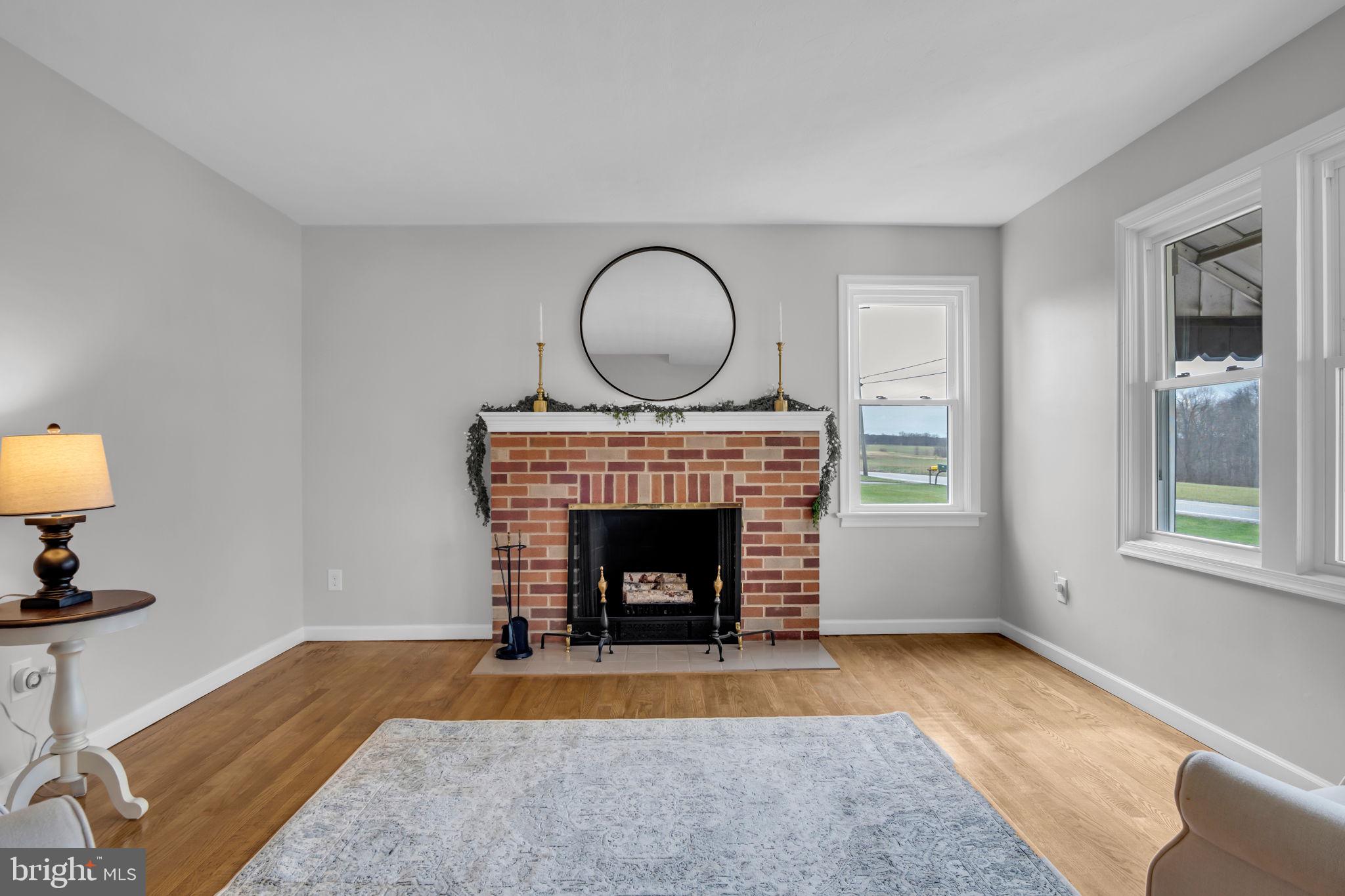 2029 Stoverstown Road Spring Grove, PA 17362 - Photo 22 of 77 a living room with furniture and a fireplace