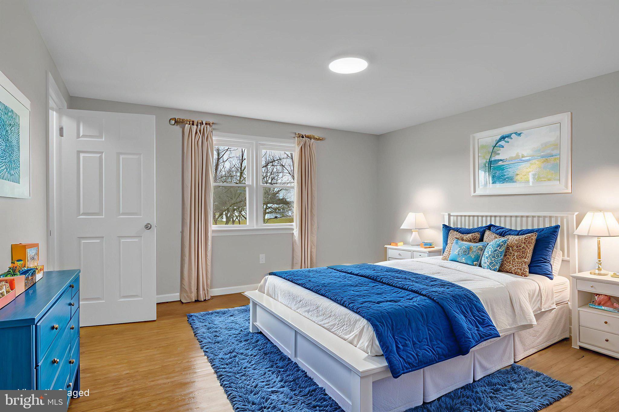 2029 Stoverstown Road Spring Grove, PA 17362 - Photo 43 of 77 a large bed sitting in a bedroom next to a window