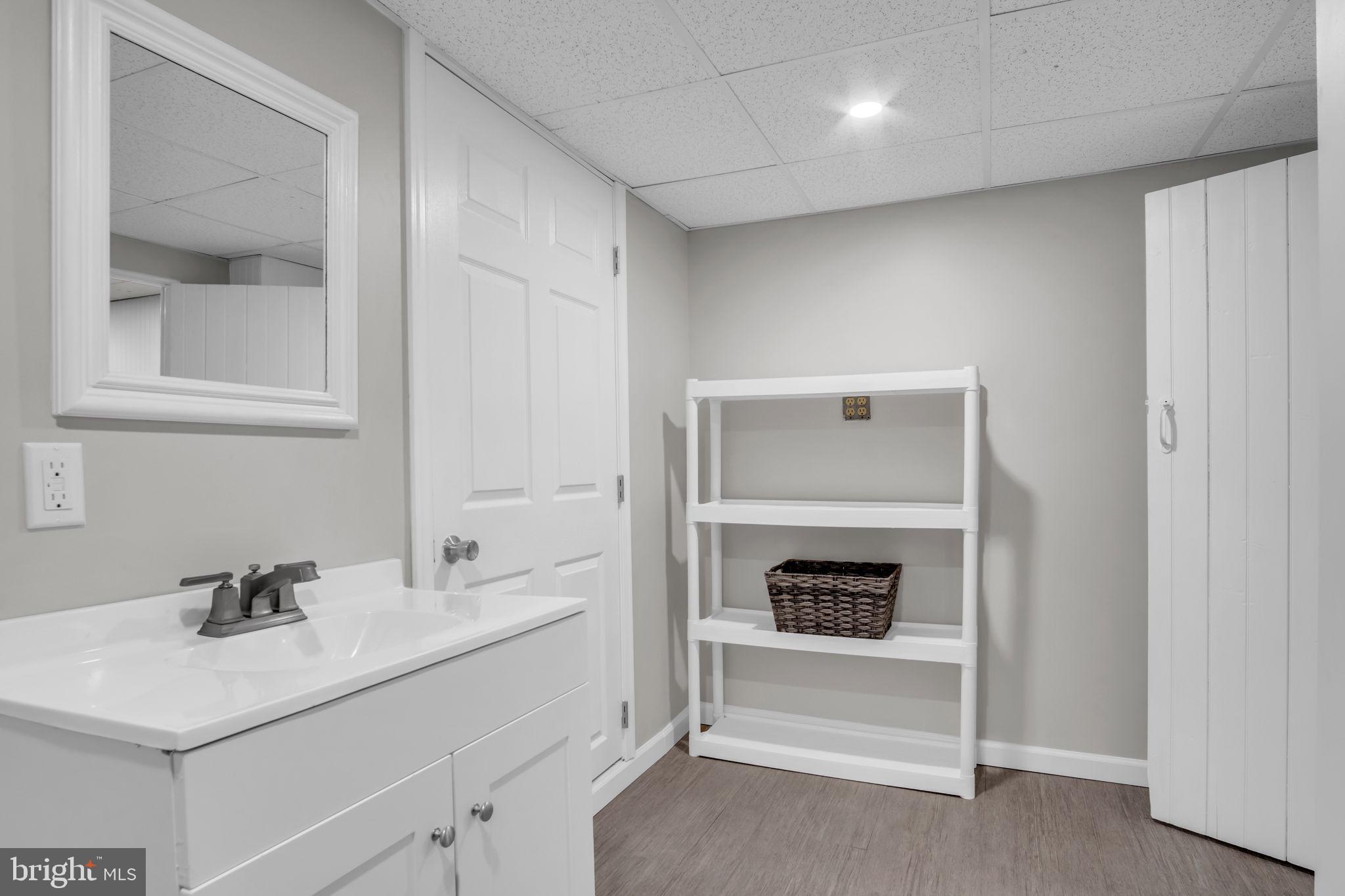 2029 Stoverstown Road Spring Grove, PA 17362 - Photo 59 of 77 a bathroom with a sink and a mirror