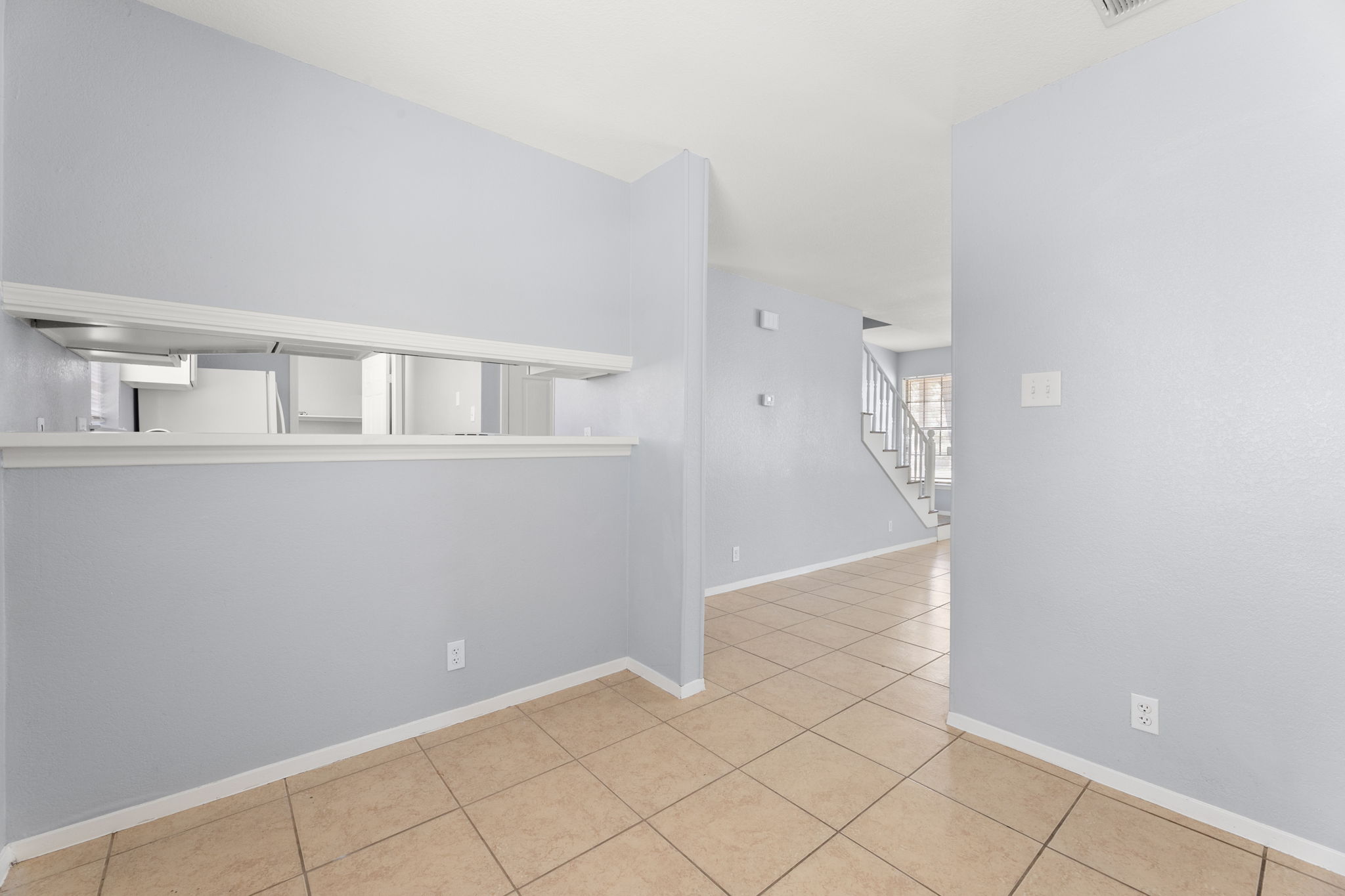 3802 Foust Trail, Unit A Georgetown, TX 78628 - Photo 9 of 34 Clean lines and a spacious layout define this inviting living space with easy-care tile.