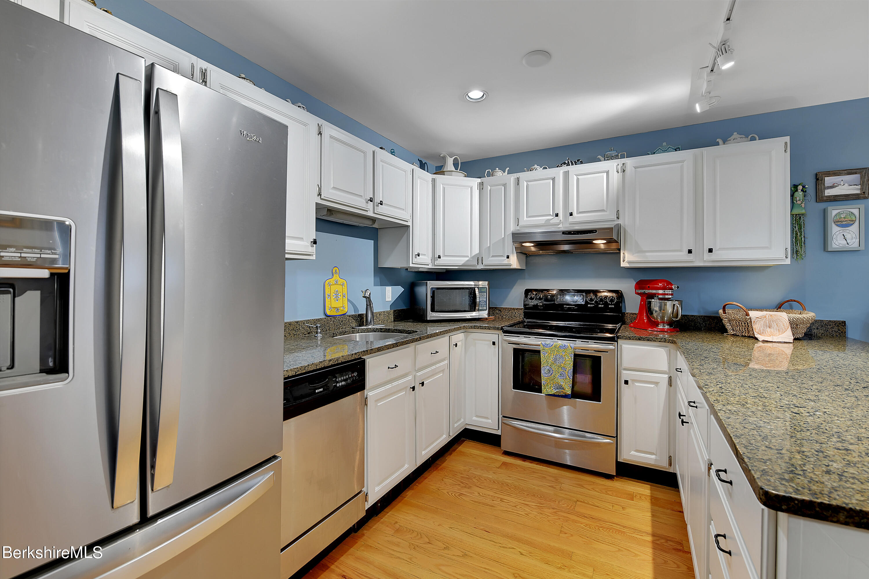 2 Wallace Road, Unit 2E Stockbridge, MA 01262 - Photo 11 of 33 a kitchen with stainless steel appliances granite countertop a refrigerator sink and cabinets