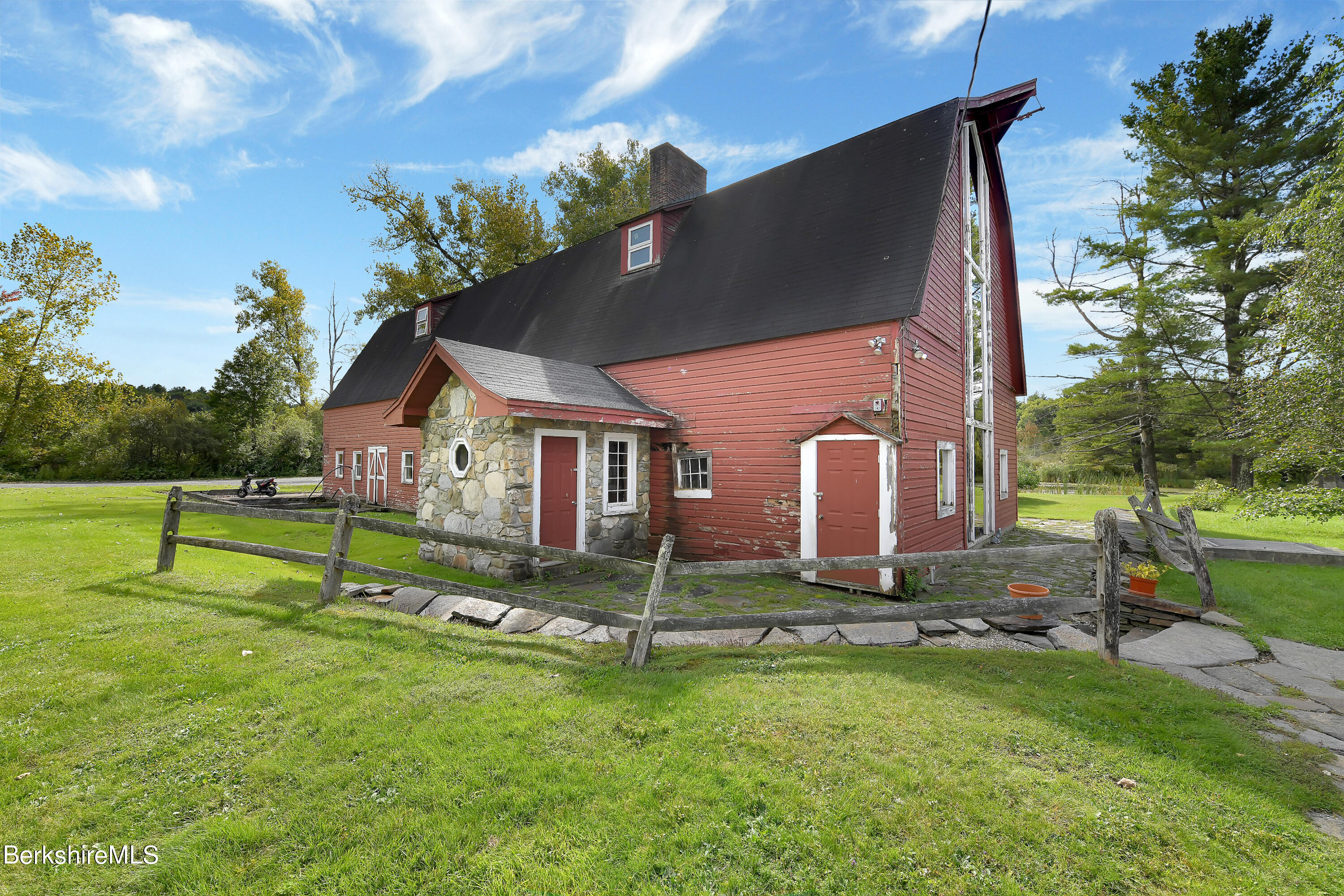 2 Wallace Road, Unit 2E Stockbridge, MA 01262 - Photo 31 of 33 a house that has a big yard
